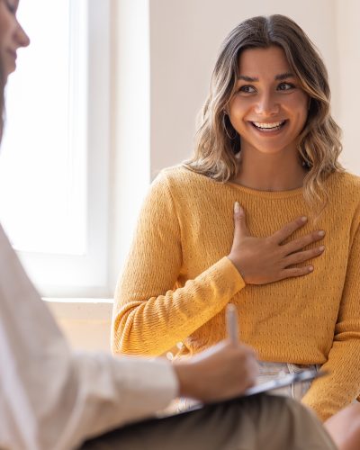 Psychologist listening to her patient